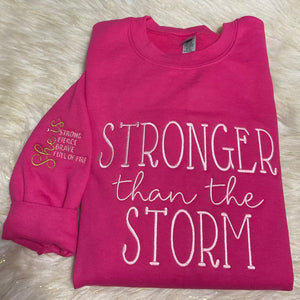 STRONGER THAN THE STORM EMBROIDERED SWEATSHIRT
